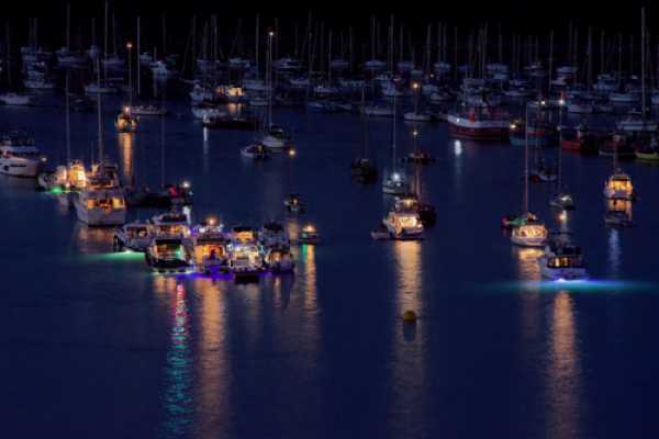 27 August 2022 - 20:56:11
"The fleet's  lit up!"  No official guardship, but the visiting boats turned on their illuminations. Possibly not too many of those on board will know about Lt-Commander Thomas Woodroofe and his famous words. Look him up.
------------------
River Dart at night post Regatta